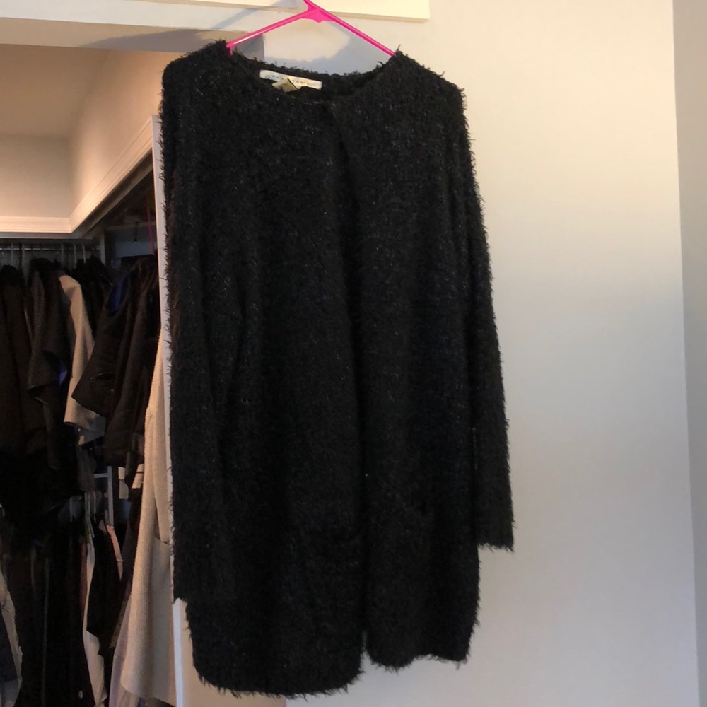 Black sweater with blue highlights